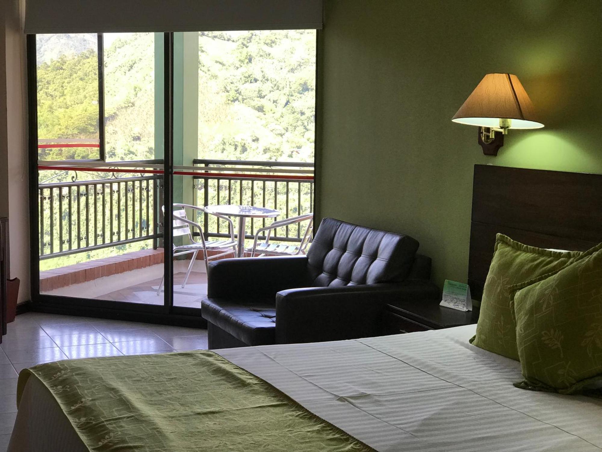 Casa Morales Hotel Internacional Y Centro De Convenciones Ibagué Exterior foto A room at the hotel